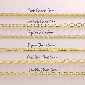May include: A selection of gold-colored chain necklaces, each with a different design. The image includes text labels for each chain style, such as "Curb Chain 3mm" and "Oval link Chain 9mm". The chains are displayed against a light background.