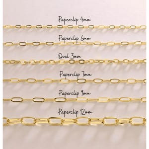May include: A close-up of six gold-colored chain necklaces. The chains vary in style and size, with text labels indicating the type and millimeter size: Paperclip 4mm, Paperclip 6mm, Oval 3mm, Paperclip 7mm, Paperclip 9mm, and Paperclip 12mm.