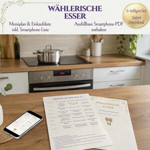 May include: A six-piece digital meal planning set titled Wählerische Esser, featuring a printed weekly menu planner, a shopping list, and a smartphone-compatible PDF. The documents display text in German, including a meal schedule and instructions.