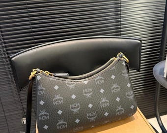 MCM Style Black Leather Shoulder Bag, Cowhide Leather, Elegant Design