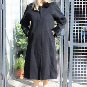 Vintage Black Wool Midi Coat: 1980s Velvet Trim Forecaster