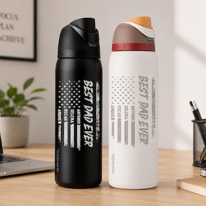 May include: Two Owala water bottles, one black and one white, each featuring a vertical American flag graphic, the text BEST DAD EVER, and four names: Andrew, Oscar, Selena, and Antonio. Both bottles have a flip-top lid and a carry handle.
