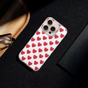 Hjärtliknande telefonskal Comme Des Garçons för iPhone 17 Pro Max, 16e, 15, 14, 13 och Samsung S26 Ultra, S25 FE, A57, A56, Pixel 10, 9A bild 2