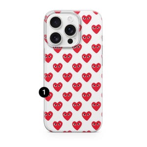 Hjärtliknande telefonskal Comme Des Garçons för iPhone 17 Pro Max, 16e, 15, 14, 13 och Samsung S26 Ultra, S25 FE, A57, A56, Pixel 10, 9A 1