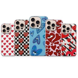 Hjärtliknande telefonskal Comme Des Garçons för iPhone 17 Pro Max, 16e, 15, 14, 13 och Samsung S26 Ultra, S25 FE, A57, A56, Pixel 10, 9A bild 1