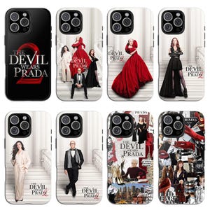 May include: A collection of phone cases featuring designs inspired by the movie "The Devil Wears Prada." The cases showcase various scenes and characters, with the film's title prominently displayed. The cases are black and white with pops of red.