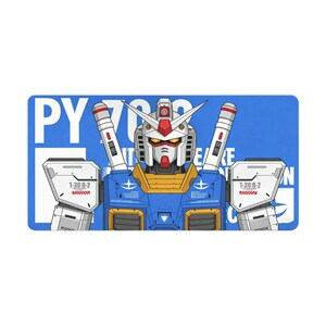 May include: Rectangular blue and white graphic featuring a robot with a red, white, blue, and yellow color scheme. The robot has a detailed design with text that reads "PY 70" and "1-20 8-2".