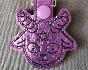 Baphomet vinyl snap tab keychain (metallic purple with black thread)