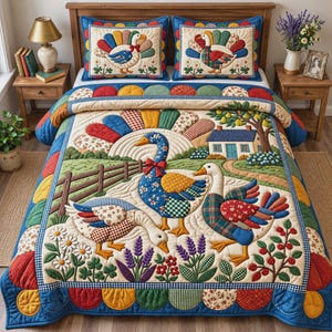May include: A quilted bedspread and two matching pillow shams featuring a colourful farm scene with three geese, a small house, and floral motifs. The design uses patchwork patterns in blue, red, yellow, and green on a cream-coloured background.