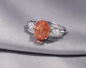 Gerhodineerde sterlingzilveren zonnesteenring, ovale edelsteen met peer zirkonia