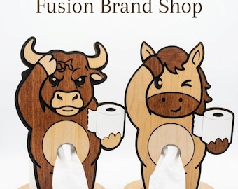 May include: Two wooden toilet paper holders, one shaped like a bull and the other like a horse. The bull is brown with a light brown center, and the horse is light brown with a darker brown mane. Each holds a roll of white toilet paper and dispenses it from the bottom.