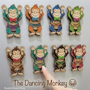 May include: A set of three ceramic mugs with a speckled, matte finish. The mugs are in shades of cream, light gray, and dark gray. Each mug has a simple, modern design and a rounded handle.