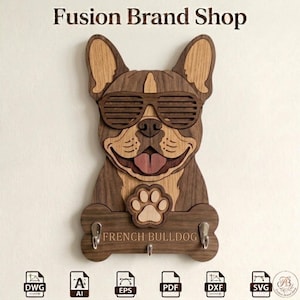 May include: A wooden French Bulldog key holder with sunglasses, a paw print, and the words "FRENCH BULLDOG". The key holder has three hooks and is made of layered wood in shades of brown and tan. The text "Fusion Brand Shop" is at the top.
