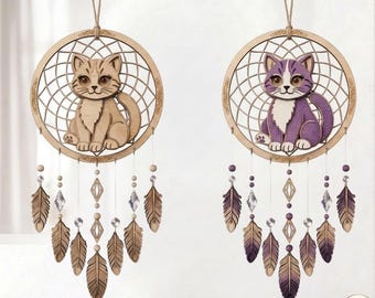 May include: Two wooden dream catchers with cat designs. One cat is tan, the other is purple and white. Each dream catcher has a circular frame, a webbed center, and hanging feathers and crystals. The text "Fusion Brand Shop" is at the top.