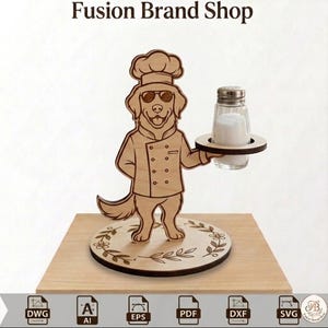 May include: Wooden salt shaker holder featuring a chef dog wearing sunglasses and a chef's hat. The dog holds a salt shaker on a wooden tray. The base is a wooden platform with a floral design. The text "Fusion Brand Shop" is at the top.