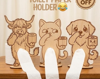 May include: Wooden toilet paper holders featuring a Highland cow, cat, and dog, each holding a roll of toilet paper. The holders have a humorous design, with the text "FUNNY TOILET PAPER HOLDER" at the top. A "15% OFF" sticker is also visible.