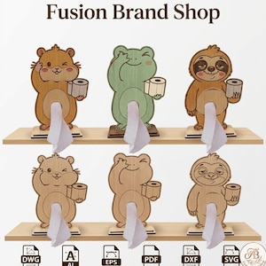Op de afbeelding: Houten tissuehouders in de vorm van een hamster, kikker en luiaard. Elke houder houdt een rol toiletpapier vast en geeft tissues af. De tekst "Fusion Brand Shop" staat bovenaan de afbeelding.