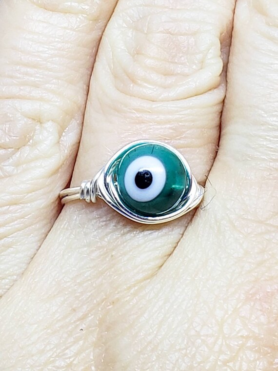 Green evil eye ring deals