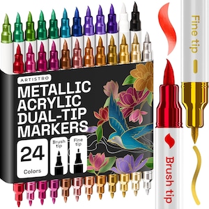 K&ouml;nnte beinhalten: Ein Set mit 24 Metallic-Acrylmarkern mit zwei Spitzen in verschiedenen Farben. Die Marker tragen die Marke "ARTISTRO" und verf&uuml;gen &uuml;ber Pinsel- und feine Spitzen. Die Verpackung zeigt Blumen- und Vogelillustrationen.