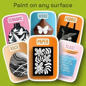 May include: Image showcasing various surfaces like ceramic, wood, fabric, rock, paper, and glass, each with a painted design. The text "Paint on any surface" is at the top. Examples include a vase, a wooden butterfly, a tote bag, a rock, a paper stencil, and a candle.