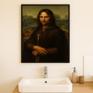 May include: Framed portrait of a man in a dark cloak, holding a sword. The artwork is reminiscent of the Mona Lisa style, with a landscape background. The frame is black, and the portrait is hanging above a white sink.