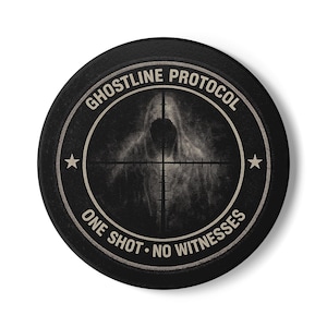 May include: A round, black patch with the words "GHOSTLINE PROTOCOL" and "ONE SHOT • NO WITNESSES" in white. A hooded figure is centered within a crosshair design. Two stars flank the figure.