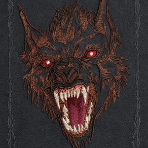 May include: An embroidered design of a snarling demon wolf with red eyes and sharp teeth. The wolf's fur is brown and black, set against a dark gray background with a decorative border. The text "DEMON WOLF EMBROIDERY DESIGN" is at the bottom.