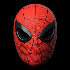 May include: A red Spider-Man mask with black eye coverings and a web pattern. The mask is a vibrant red with black lines forming the web design. The eye coverings are black and angular, contrasting with the red. The background is black.