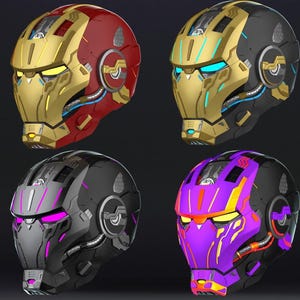 May include: Four futuristic helmets in gold, red, black, and purple. Each helmet has a faceplate design with glowing accents and mechanical details. The helmets are likely for cosplay or themed events.