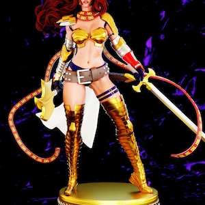 May include: A detailed figurine of a warrior woman in gold armor, holding a sword and a whip-like weapon. The figure has red hair and is posed on a decorative base with a red and gold design. The background is a dark purple.