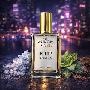 May include: A rectangular perfume bottle with a gold cap and label. The label reads "VAEL E.112 ROMAN" and "1 oz / 30 ml". The bottle is surrounded by salt crystals and green leaves. The background is a blurred cityscape.