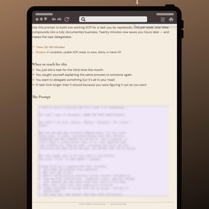 May include: A digital tablet shows the text "The One SOP Sprint". The screen displays instructions on creating a Standard Operating Procedure (SOP) for a task. The text includes time estimates and when to use the prompt. The tablet is set against a brown background.