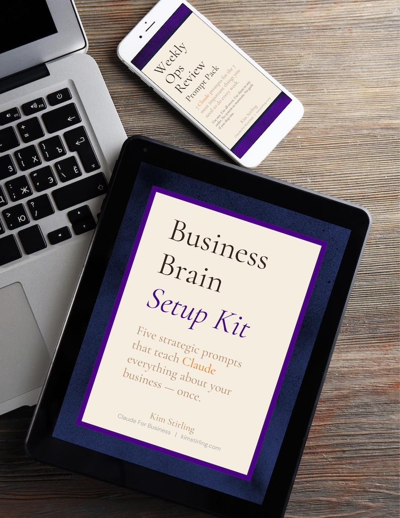 May include: A laptop, tablet, and smartphone are arranged on a wooden surface. The tablet displays "Business Brain Setup Kit" with text about prompts. The phone shows "Weekly Ops Review Prompt Pack".