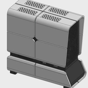 May include: A grey computer case with a futuristic design. The case has a rectangular shape with rounded edges and is divided into multiple sections. It features ventilation grilles and a black base, suggesting a focus on airflow and cooling.