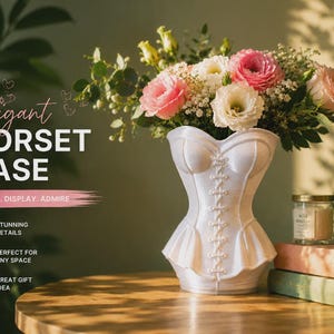 May include: A white vase shaped like a corset with a central lace-up detail, filled with a bouquet of pink and white flowers. Text on the left reads: Elegant CORSET VASE, PRINT. DISPLAY. ADMIRE, STUNNING DETAILS, PERFECT FOR ANY SPACE, GREAT GIFT IDEA.