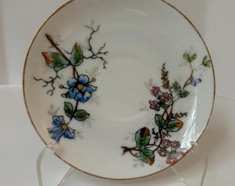 Charles Field Haviland Floral and Gold Rimmed Teacup Saucer