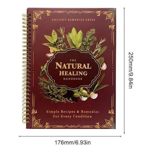 May include: A spiral-bound handbook titled "The Natural Healing Handbook" with a burgundy cover. The cover features illustrations of herbs and the text "Simple Recipes & Remedies For Every Condition." The book measures 6.93 inches wide and 9.84 inches tall.
