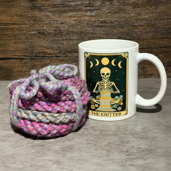 Chunky hand-painted wool-blend coasters with cosmos flower art — tactile, colorful, and clearly made by an actual human with a paintbrush, not a Cricut.