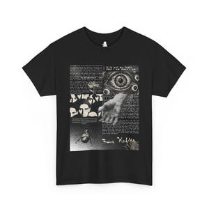 May include: Black t-shirt featuring a collage of grayscale images and text. The design includes a close-up of an eye, a hand, and a beetle, along with the text "It is not my fault that I am what I am."
