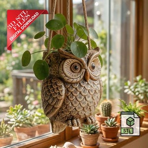 May include: A hanging owl-shaped planter made of ceramic, filled with a green plant. The planter is brown with detailed feather and eye designs. The image includes a red corner banner that says "3D STL FILES DIGITAL DOWNLOAD".