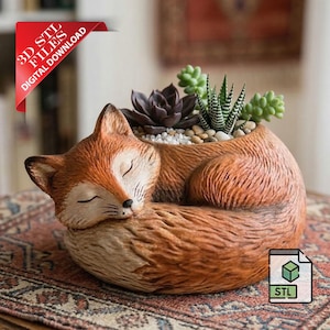 May include: A sleeping fox-shaped planter, holding succulents and small stones. The fox is a warm orange-brown color with a white belly and closed eyes. The planter is on a patterned rug. The image includes a "3D STL FILES DIGITAL DOWNLOAD" tag.