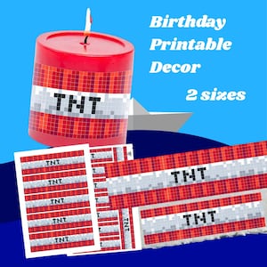 May include: A red candle with a TNT design and a lit wick, alongside printed labels. The text "Birthday Printable Decor" and "2 sizes" are displayed on a blue background.