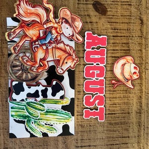 Puede incluir: Un conjunto de recortes de papel decorativos que presenta a un niño de dibujos animados montando un caballo, una rueda de carreta, un cactus, el número uno con estampado de vaca, un sombrero de vaquero y la palabra AUGUST en letras rojas.