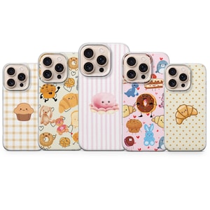 Könnte beinhalten: Fünf Handyhüllen mit verschiedenen Designs zum Thema Essen. Die Hüllen zeigen Illustrationen eines Cupcakes, eines Kekses, eines Croissants, eines Donuts und eines Oktopus. Die Hüllen haben einen transparenten Rand und sind vor einem weißen Hintergrund platziert.