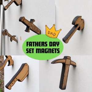 May include: A set of wooden tool-shaped magnets including an axe, sword, cleaver, and pickaxe. A yellow crown graphic with the text DAD and a green oval with the text FATHERS DAY SET MAGNETS are overlaid on the image of the brown and black magnets.