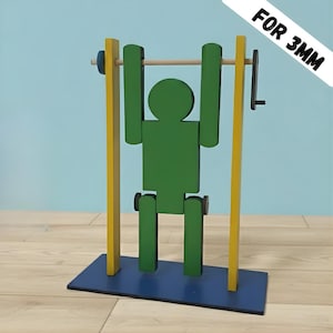 Pode incluir: Um conjunto de três canecas de cerâmica com acabamento fosco e salpicado. As canecas são em tons de creme, cinza claro e cinza escuro. Cada caneca tem um design simples e minimalista e uma alça arredondada.