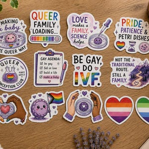 May include: A collection of twelve vinyl stickers featuring LGBTQ+ themes related to family building and IVF. Designs include text like 'Queer Family Loading', 'Gay Agenda', and 'Be Gay, Do IVF', alongside illustrations of petri dishes, hearts, and pride flags.
