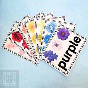 May include: A set of three ceramic mugs with a speckled, matte finish in cream, light grey, and dark grey. Each mug has a simple, minimalist design and a rounded handle.