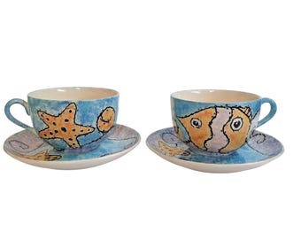 Zestaw ceramicznych filiżanek i spodków do herbaty malowany ręcznie, wzór marynistyczny, ryba, rozgwiazda, 4 szt.