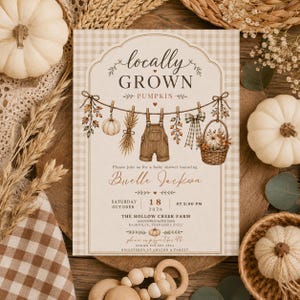 May include: A rectangular baby shower invitation card with a beige gingham background. The text reads Locally Grown Pumpkin, honoring Buelle Jackson on Saturday, October 18, 2026, at 2:00 PM at The Hollow Creek Farm, 2656 Pumpkin Patch Road, Nashville.